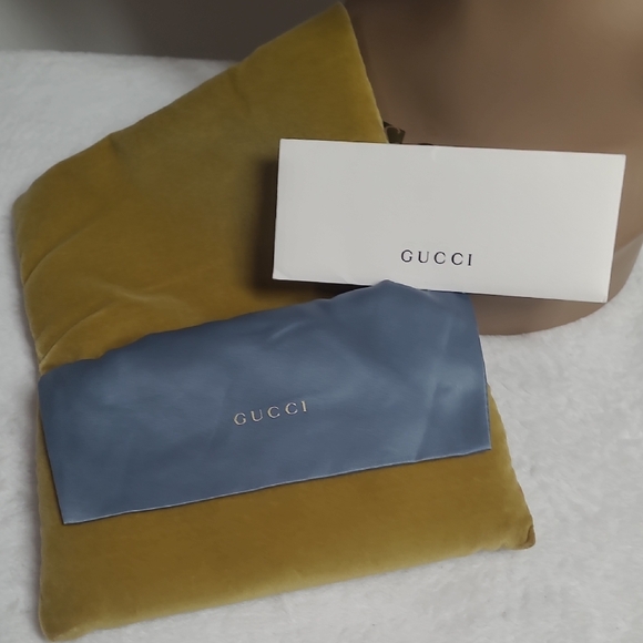 Gucci Women\'s Sunglasses with Gold Frame and Black Accents main image 8